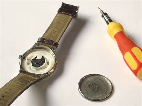 taking the back off a watch|removing watch backing without tools.